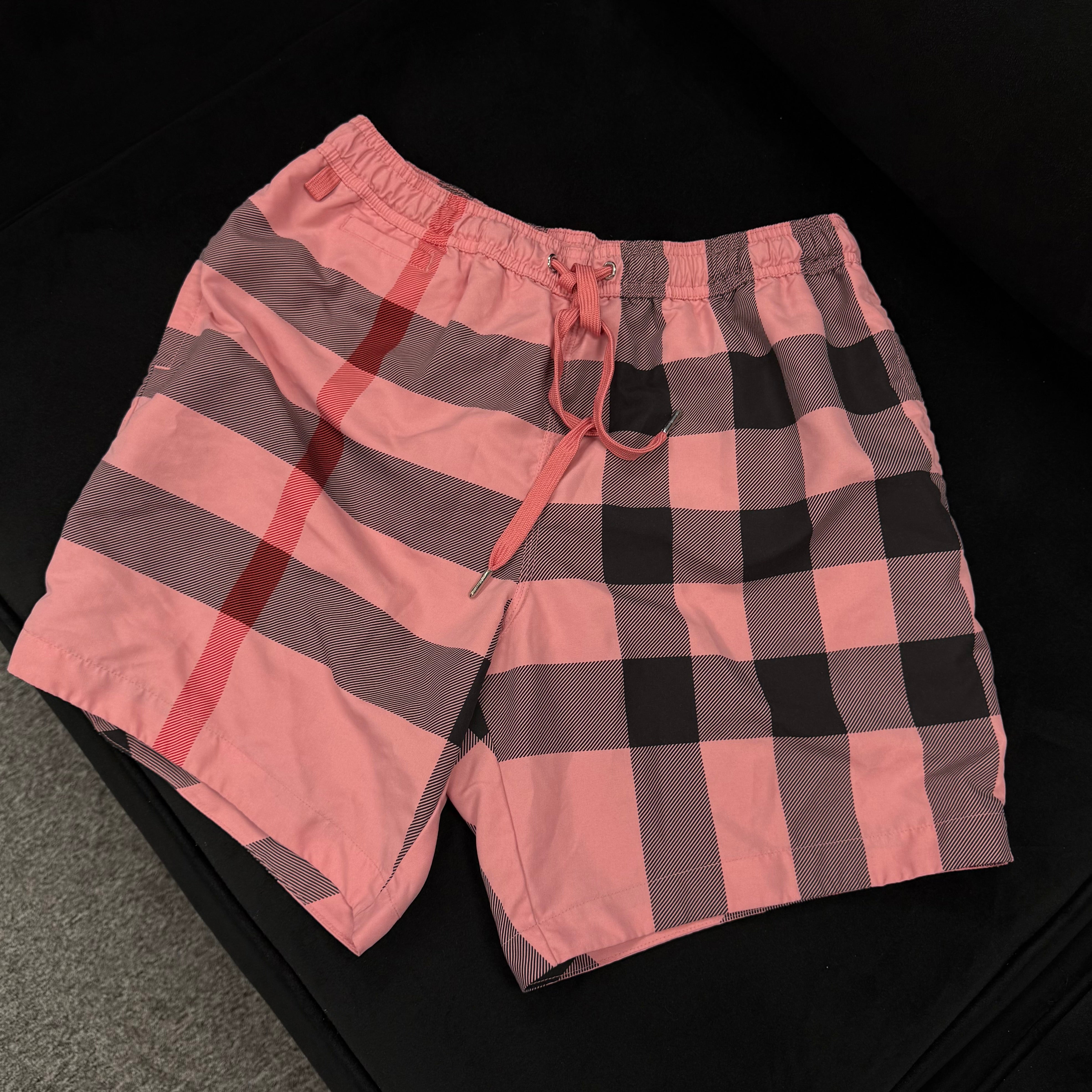 (PRE-OWNED) BURBERRY SWIM SHORTS - SALMON PINK